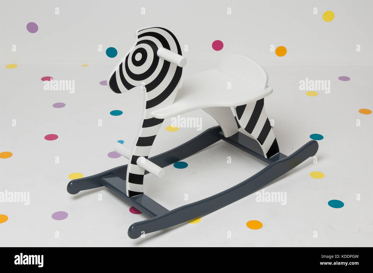 children's wooden toy zebra swing on white background Stock Photo Alamy