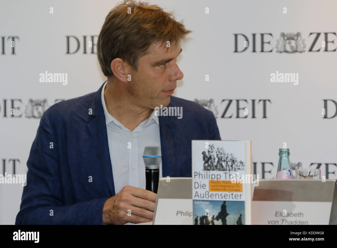 Frankfurt, Germany. 12th October 2017. Austrian historian Philipp Ther gives an interview at the booth of the German national weekly newspaper Die Zeit at the Frankfurt Book Fair. The Frankfurt Book Fair 2017 is the world largest book fair with over 7,000 exhibitors and over 250,000 expected visitors. It is open from the 11th to the 15th October with the last two days being open to the general public. Credit: Michael Debets/Alamy Live News Stock Photo