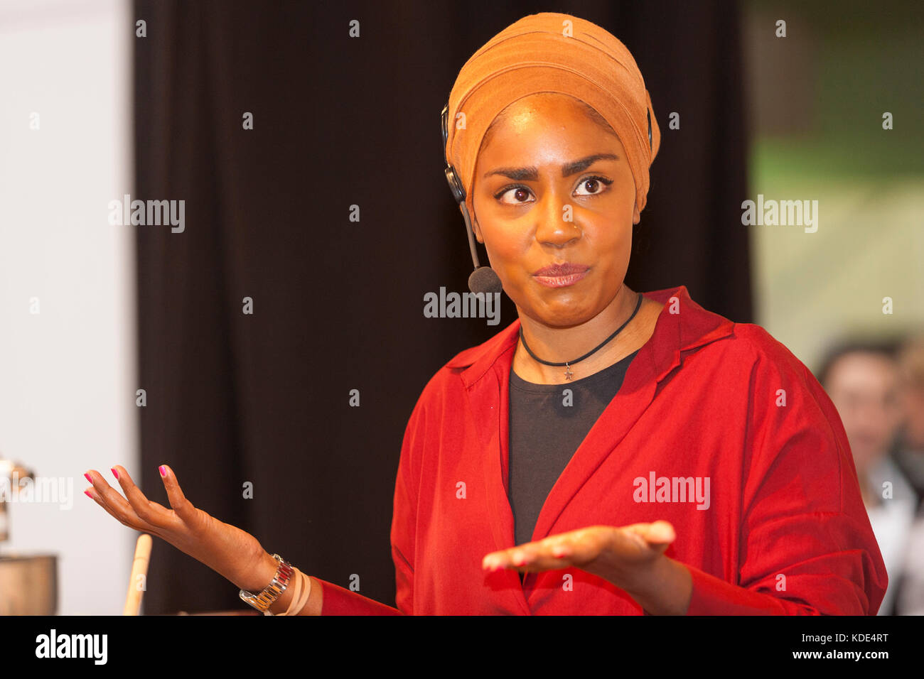 The Chocolate Show, Olympia, London UK. 13 October, 2017. Nadiya Jamir Hussain, British baker, columnist, author and television presenter, winner of BBC’s The Great British Bake Off in 2015 presents a cookery demonstration at the London Chocolate Show. Credit: Steve Parkins/Alamy Live News Stock Photo