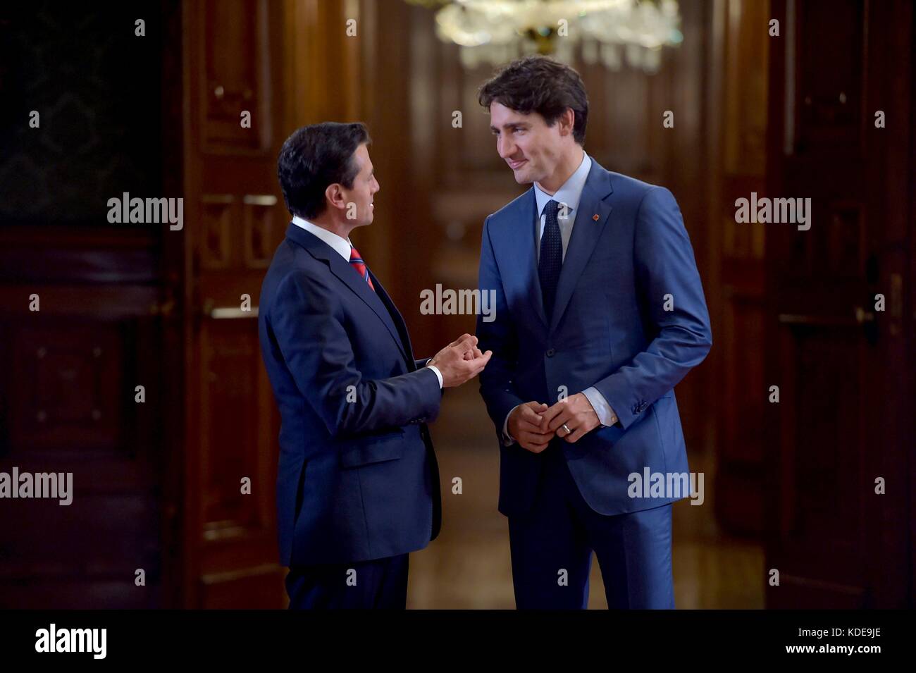 Canadian Prime Minister Justin Trudeau and Mexican President Enrique Pena Nieto walk together following a bilateral meeting at Palacio Nacional October 12, 2017 in Mexico City, Mexico.   (presidenciamx via Planetpix) Stock Photo