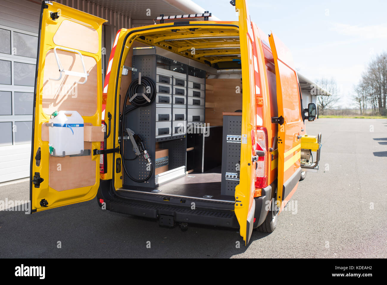 Rear view of mobile van with doors open Stock Photo Alamy