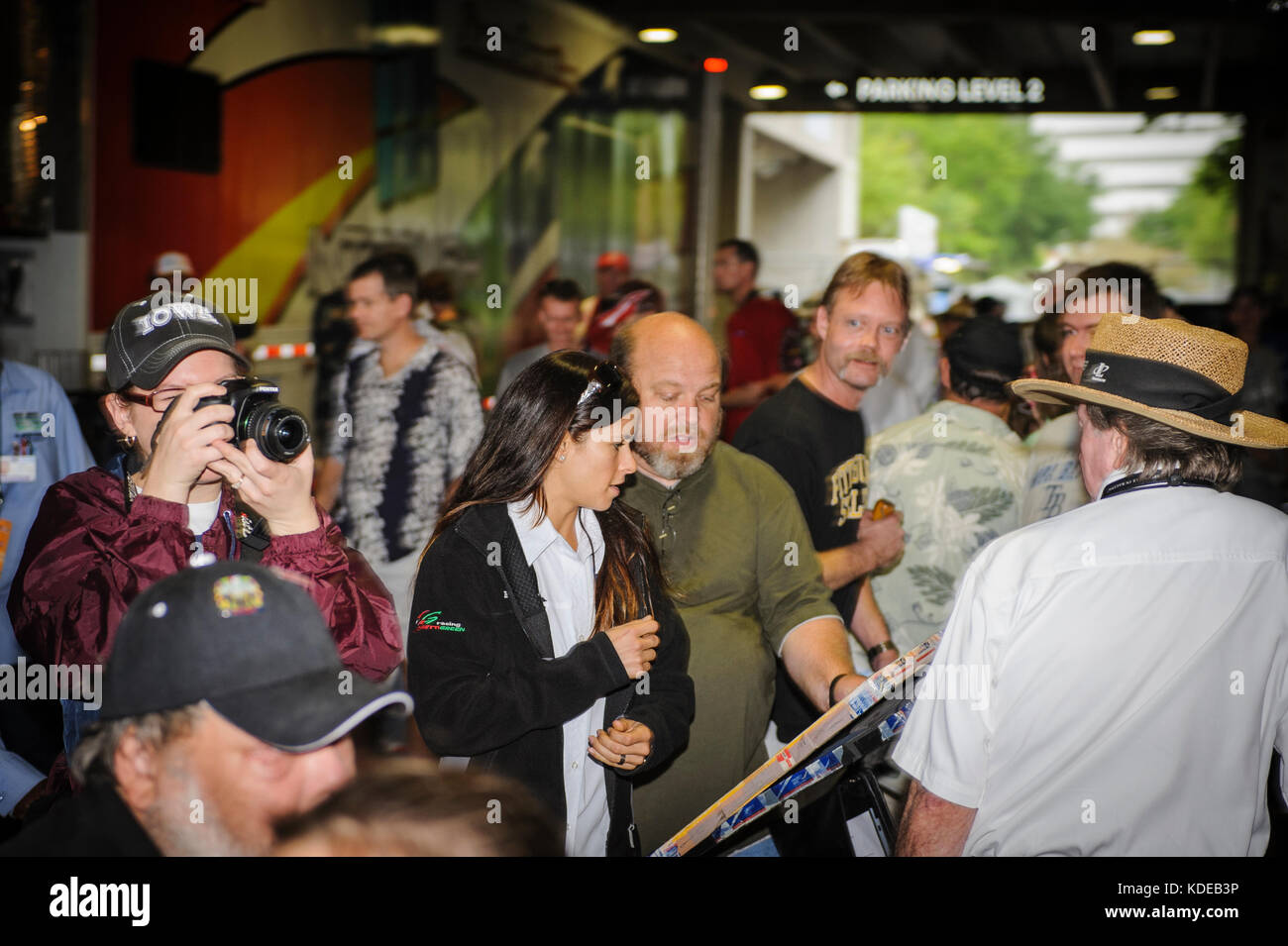 Danica Patrick, Indy Car driver, signs autographs in the crowd in the paddock at the 2009 Honda Grand Prix of St Petersburg, Florida USA. Stock Photo