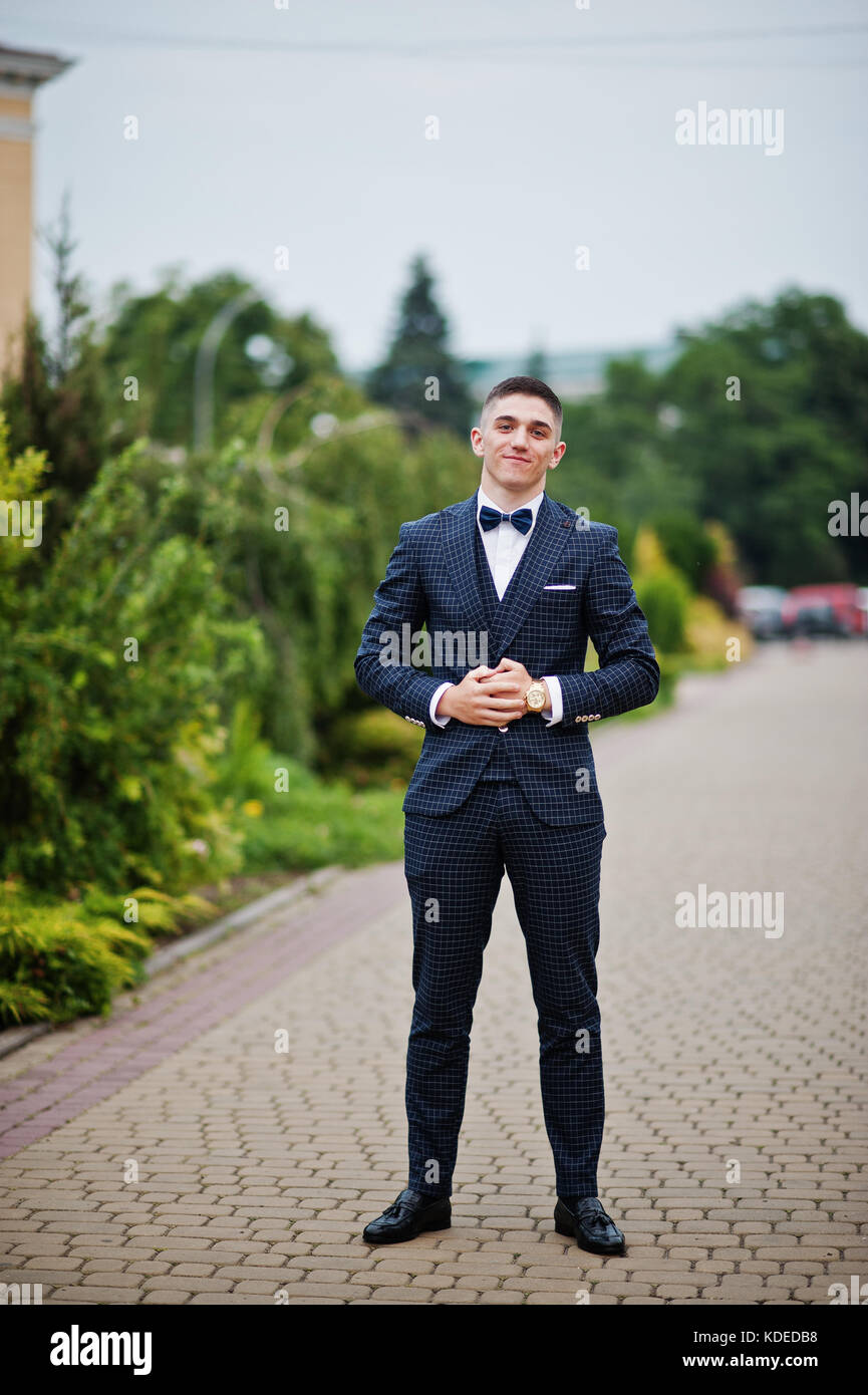 Elegant Man in Suit. Young Man Poses Outdoor Stock Photo - Image of nature,  face: 117763476