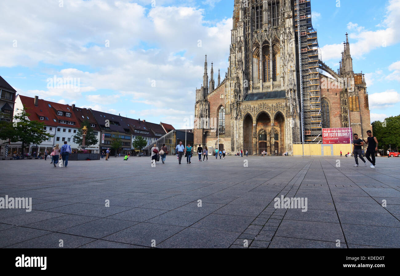 Ulm, Germany - 28th July 2017: Ulm Minster and Marketplace with tourists Stock Photo