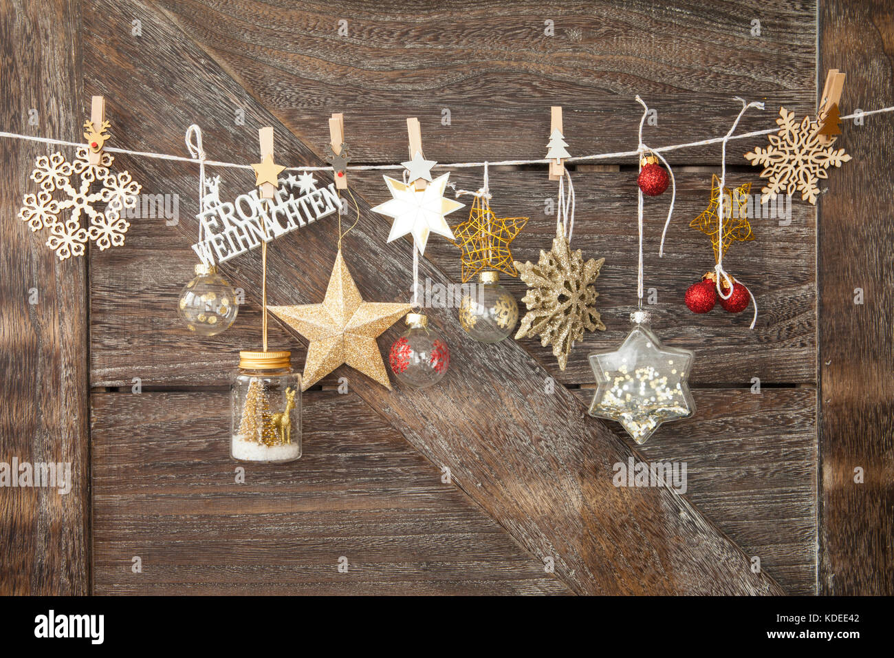 Rustic Wooden Christmas Background With Festive Ornaments Frohe Weihnachten Translates To Merry Christmas Stock Photo Alamy