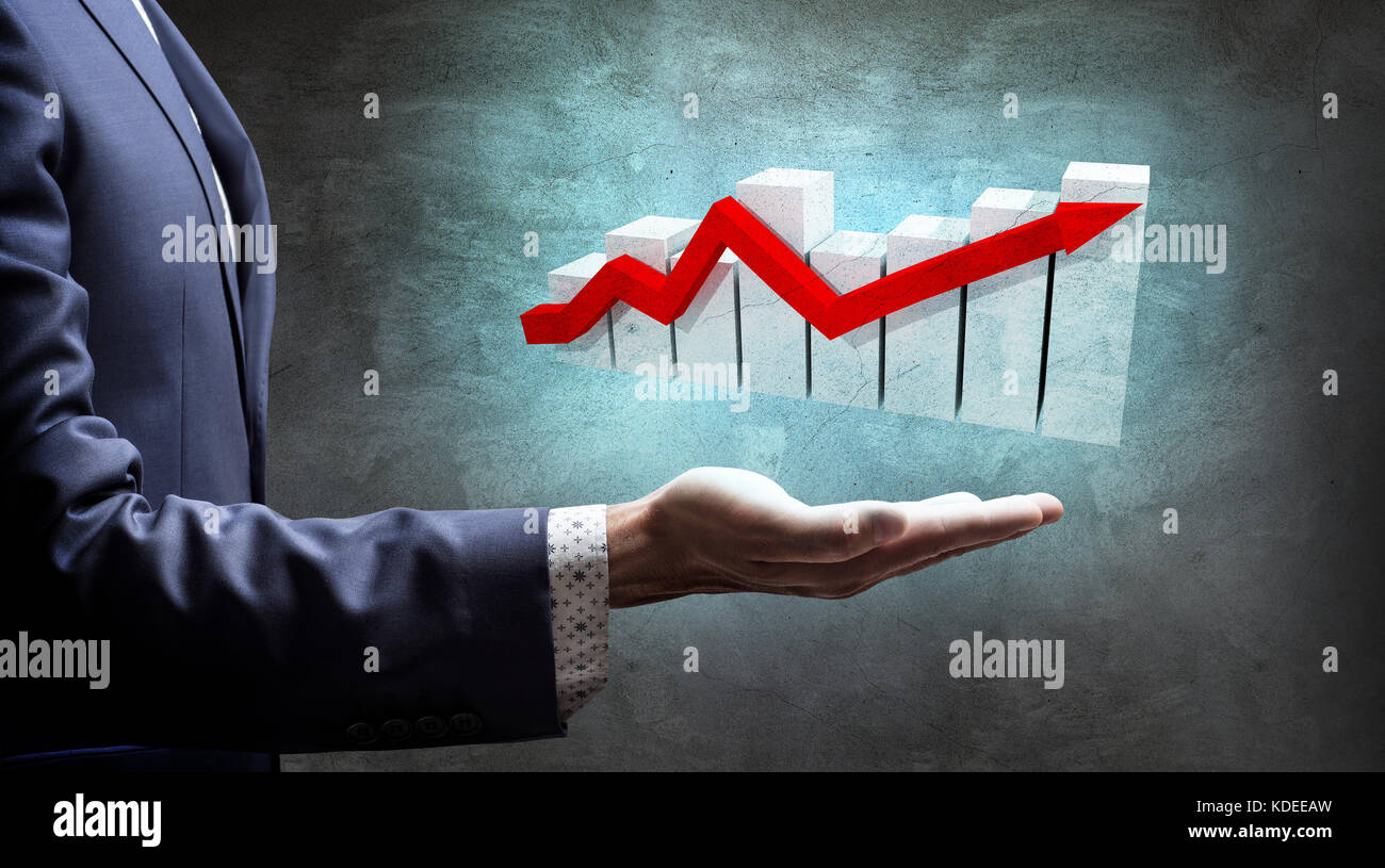 Businessman hand present big graphic with arrow. Stock Photo