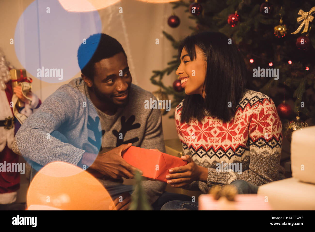happy african american couple on christmas Stock Photo - Alamy