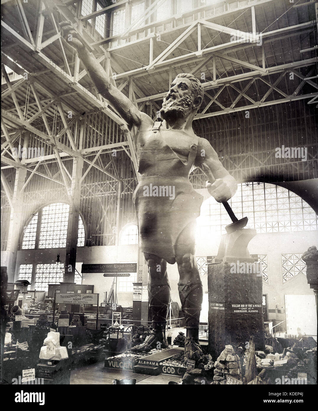 This photograph shows the massive iron statue of Vulcan, exhibited at the 1904 World's Fair in the Palace of Mines and Metallurgy, highlighting the scale and significance of this industrial art piece. Stock Photo