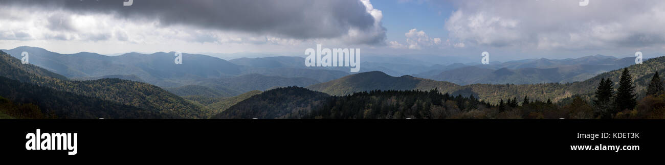 Cowee Mountain Overlook is located at milepost 430 on the Blue Ridge Parkway.  The elevation at this point is 5,950 feet, which is very near the highest point on the Blue Ridge Parkway at nearby Richland Balsam at 6,053 feet.  Cowee Mountain Overlook is one of the more popular spots in the area due to the wide open views of the Nantahala National Forest, especially at sunset since the view is to the west at this point.  The Nantahala National Forest was established in 1920, and encompasses over 800 square miles within the state of North Carolina. Stock Photo