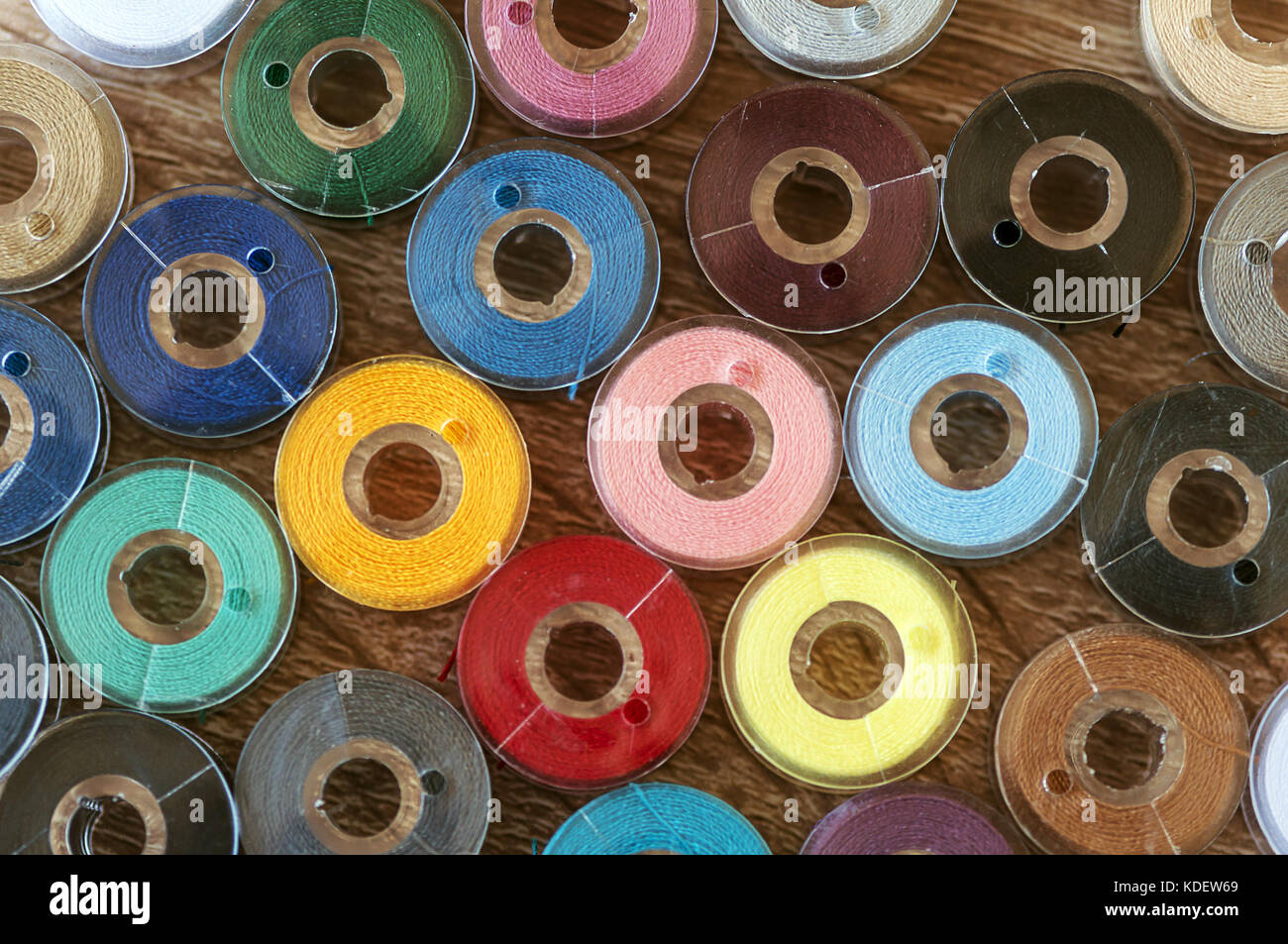 Thread Top View Close-up on colored sewing threads on spools. Top view Stock Photo - Alamy