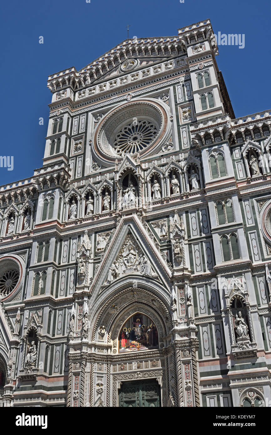 The Cattedrale di Santa Maria del Fiore  - Cathedral of Saint Mary of the Flower 336 Florence Italy Il Duomo di Firenze, as it is ordinarily called, 1296 Gothic design of Arnolfo di Cambio in 1436 Filippo Brunelleschi. The exterior Filippo Brunelleschi in various shades, green, pink, white, marble, 19th-century Gothic Revival façade by Emilio De Fabris. Stock Photo