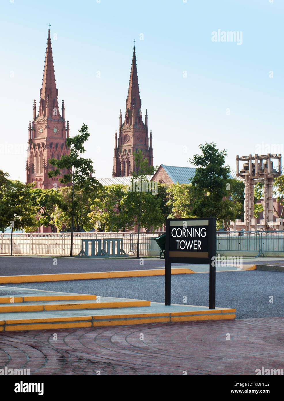 The Corning Tower sign on the Empire State Plaza with The Cathedral of the Immaculate Conception in the background in Albany, New York Stock Photo