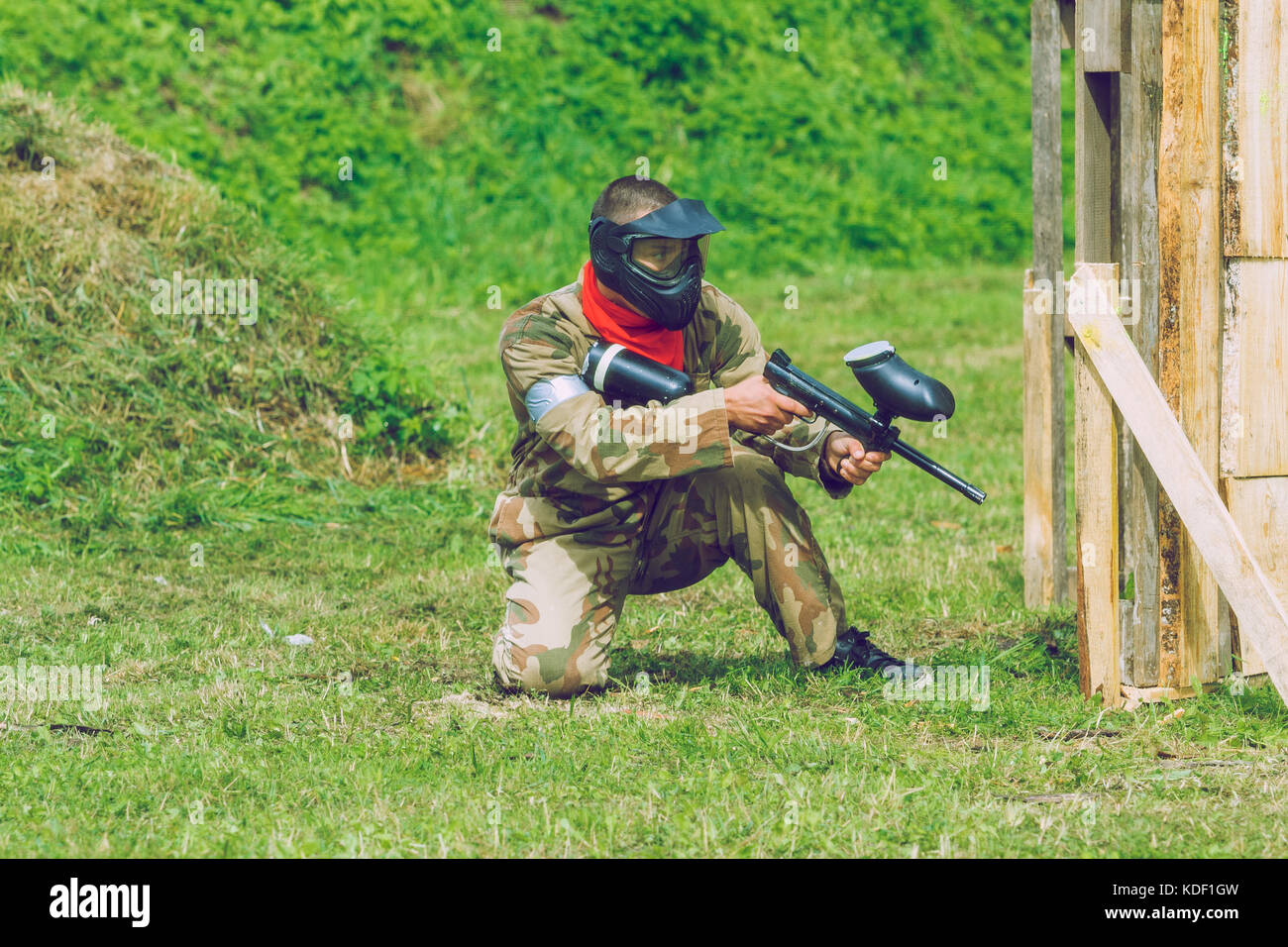 Paintball game battle, players and guns. Latvia, Cesis. 2012 Stock