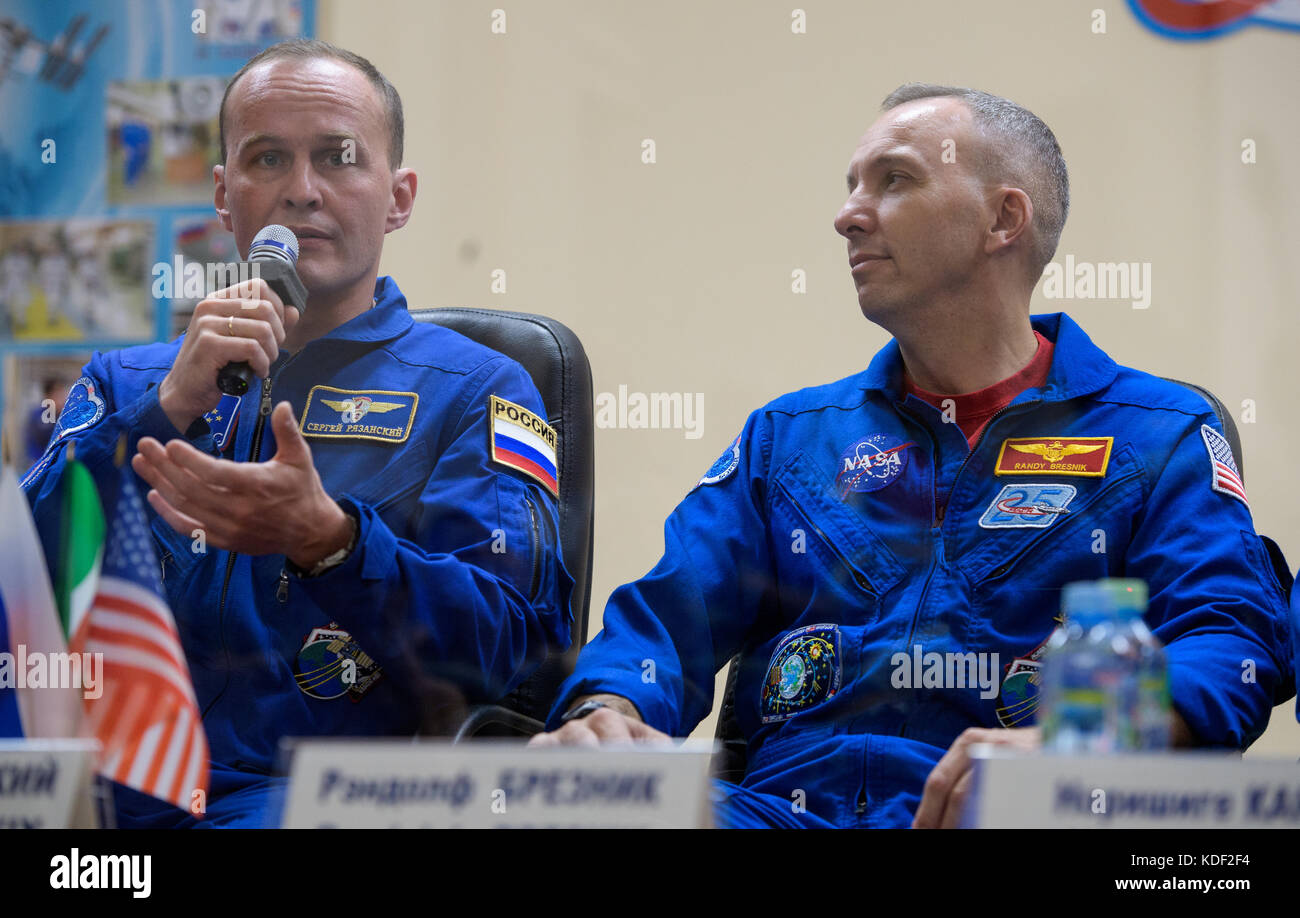 NASA International Space Station Expedition 52 Soyuz MS-05 prime crew members Russian cosmonaut Sergey Ryazanskiy of Roscosmos (left) and American astronaut Randy Bresnik attend a pre-launch press conference from behind quarantine glass at the Cosmonaut Hotel July 27, 2017 in Baikonur, Kazakhstan.   (photo by Joel Kowsky via Planetpix) Stock Photo