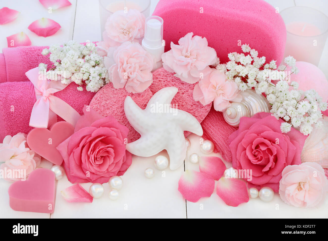 Beauty spa treatment and cleansing products with pink roses and