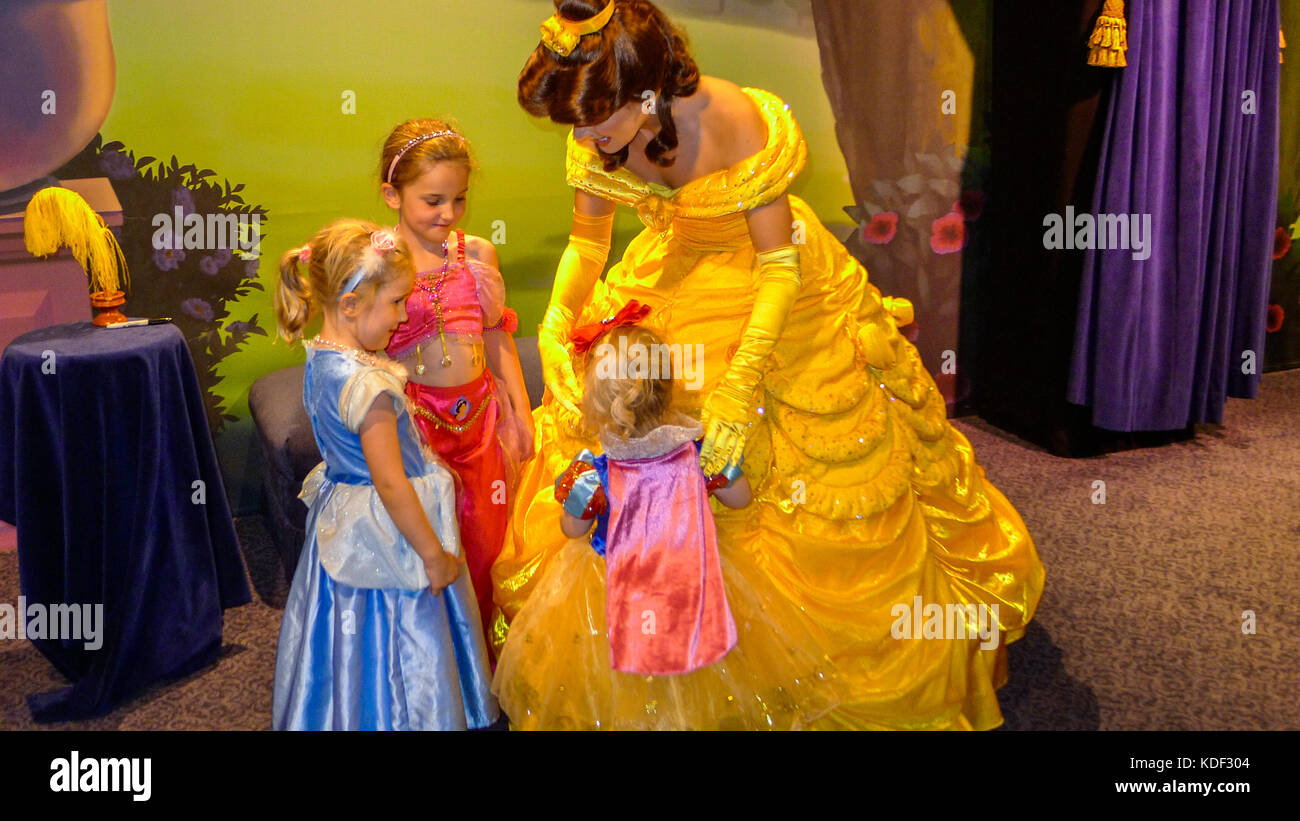 Little girls, child, children kids meeting Princess Belle, Beauty and the Beast, in Magic Kingdom, Disney World, Florida, USA Stock Photo