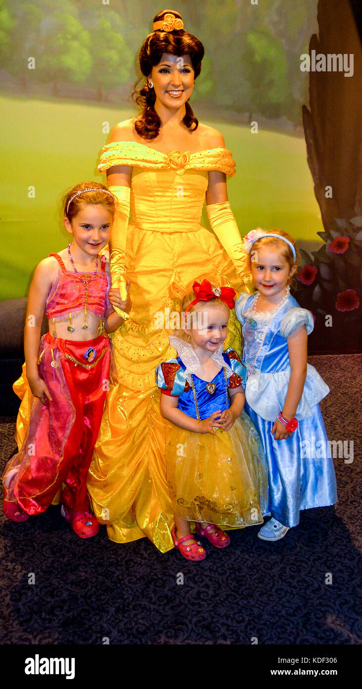 Little girls children kids meeting Princess Belle, Disney's Beauty and the Beast in Magic Kingdom, Disney World, Florida, USA Stock Photo