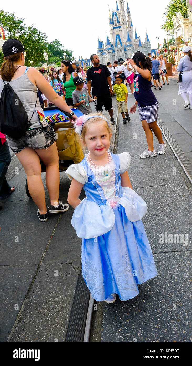 Child dressed in a Cinderella costume in Magic Kingdom, Disney World Florida, USA Stock Photo
