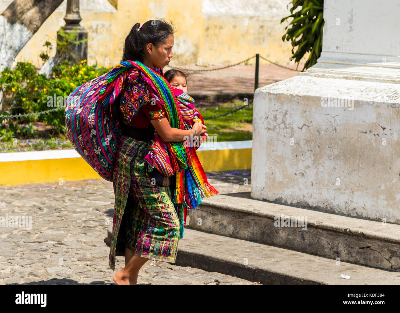 Mayan women with child, Antigua, Guatemala Stock Photo