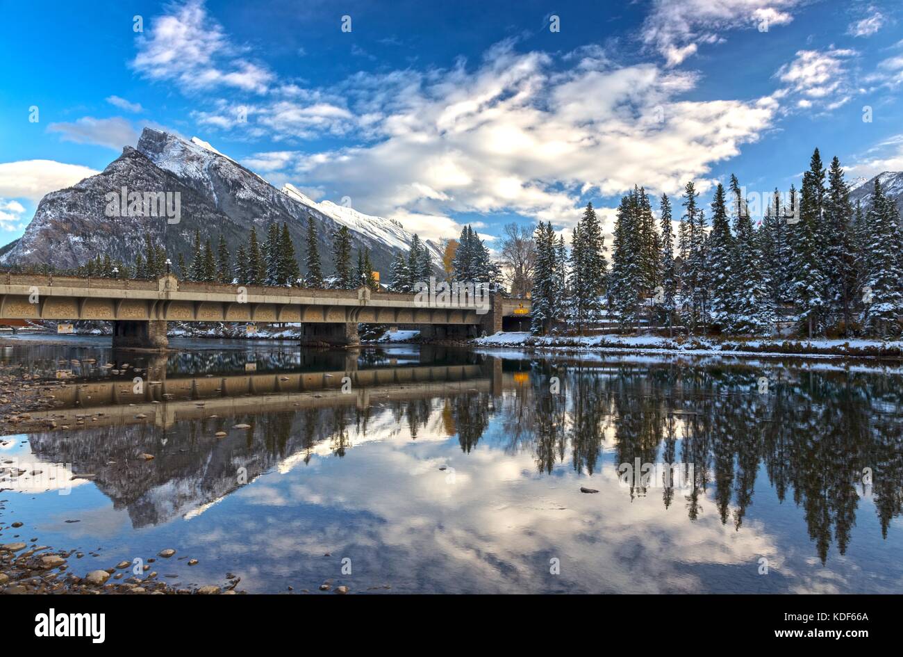 Bow River Bridge and Distant Snowy Rundle Mountain Peak Landscape View ...