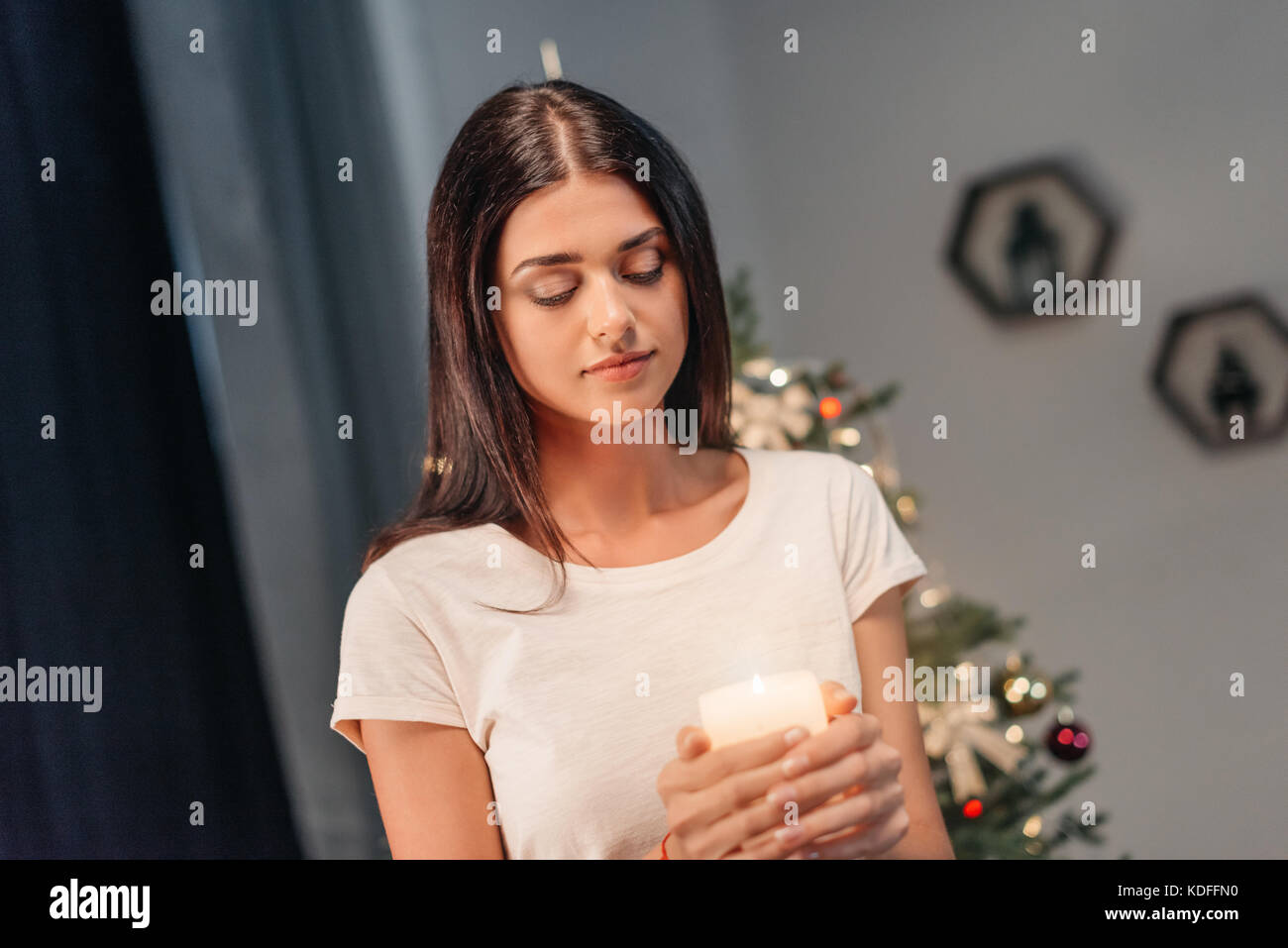 girl holding candle Stock Photo Alamy