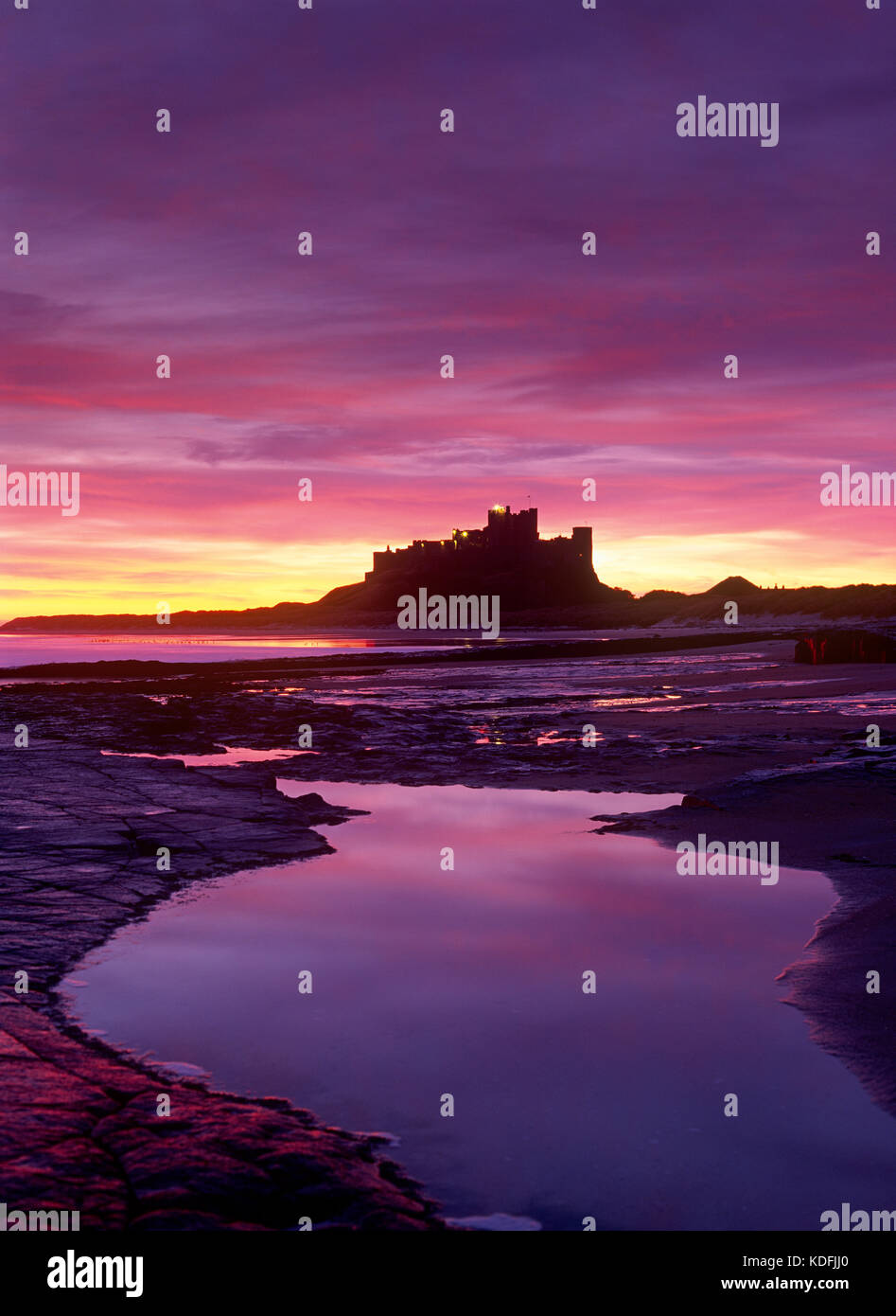 Bamburgh Castle at dawn, Northumberland, England, UK. Stock Photo