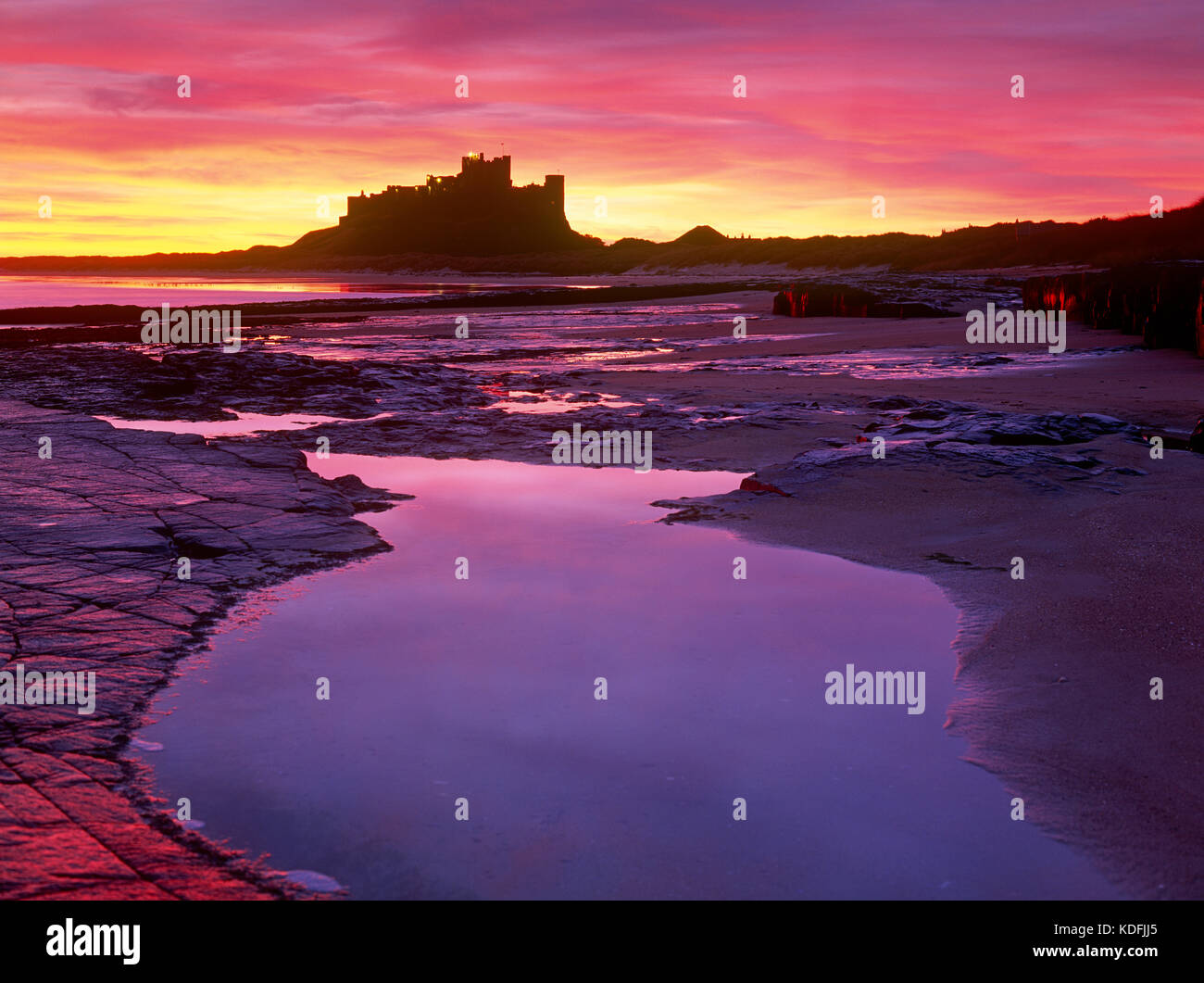 Bamburgh Castle at dawn, Northumberland, England, UK. Stock Photo