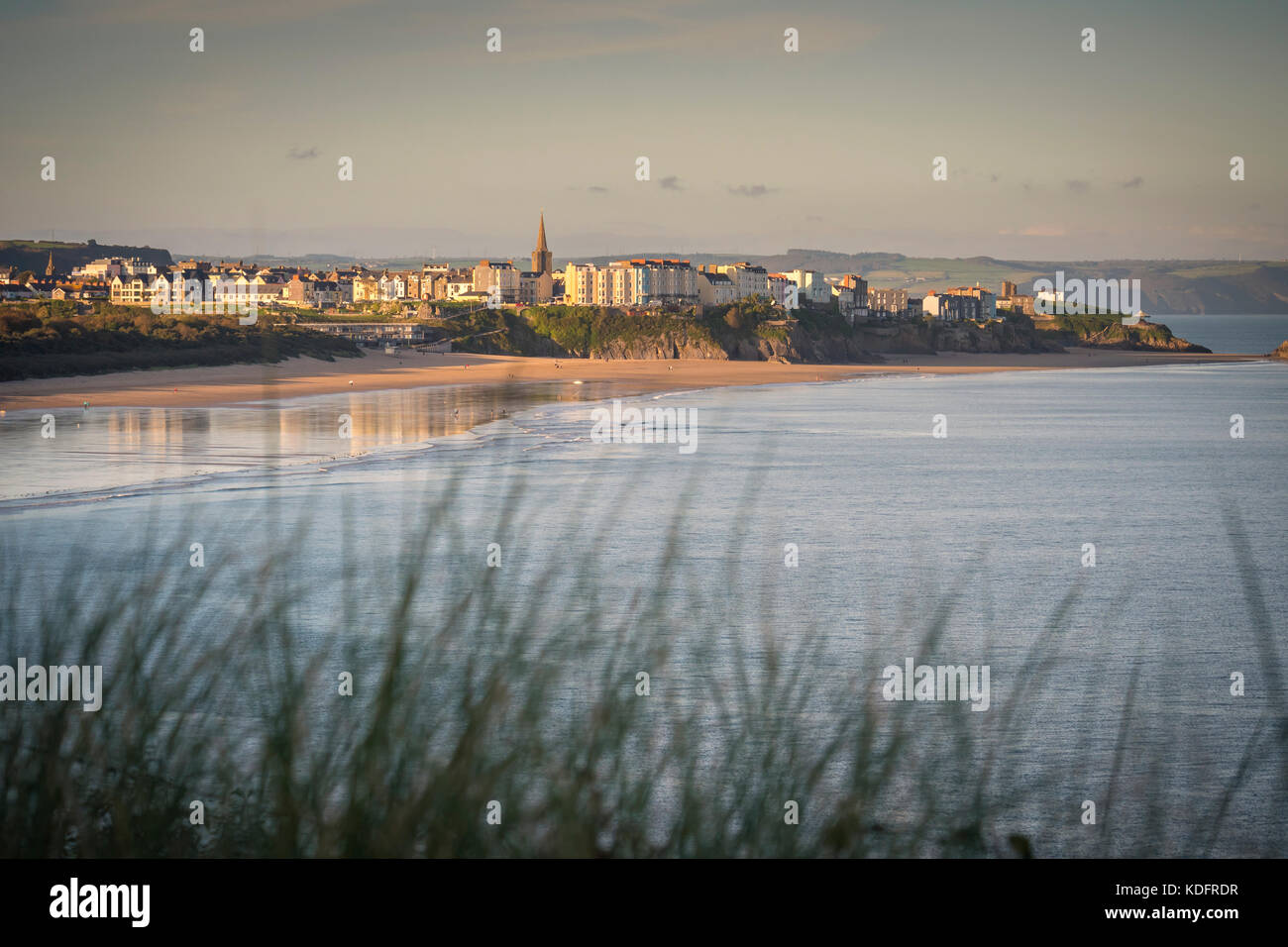Looking across South Beach Tenby to Tenby Pembrokeshire Wales Stock Photo