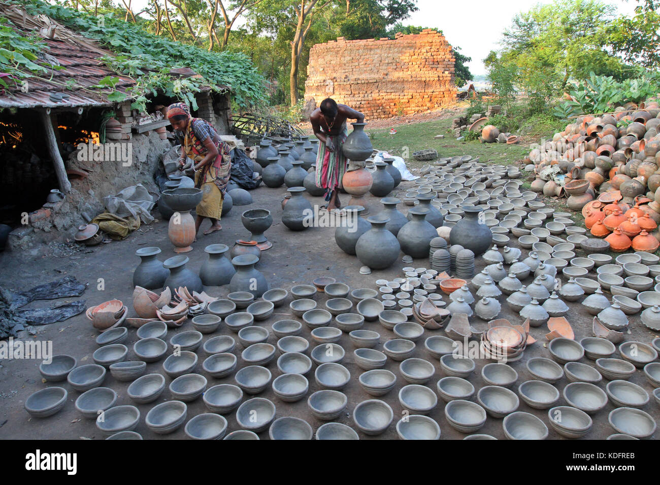 Khulna, Bangladesh Potter makes clay pot using a traditional wheel at