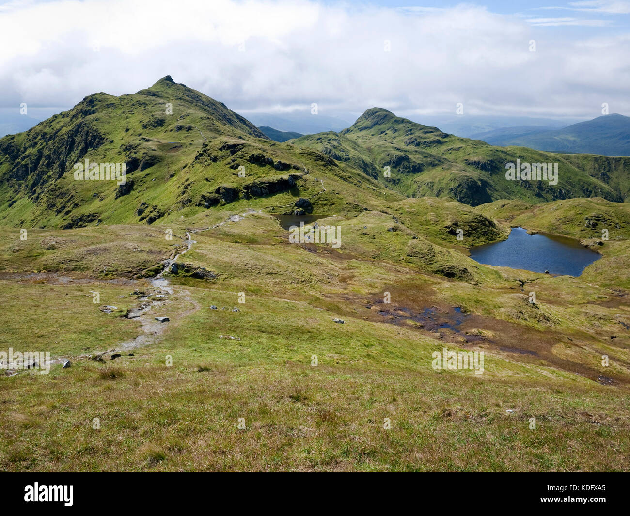 View along the Tarmachan Ridge from Meall nan Tarmachan to Meall Garbh (L) and Beinn nan Eachan (R) Stock Photo