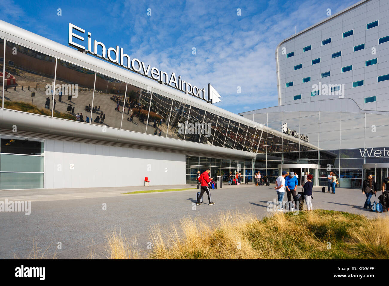 Eindhoven, Netherlands - September 22 2017: Some people are walking nearby the building of airport of Eindhoven Stock Photo
