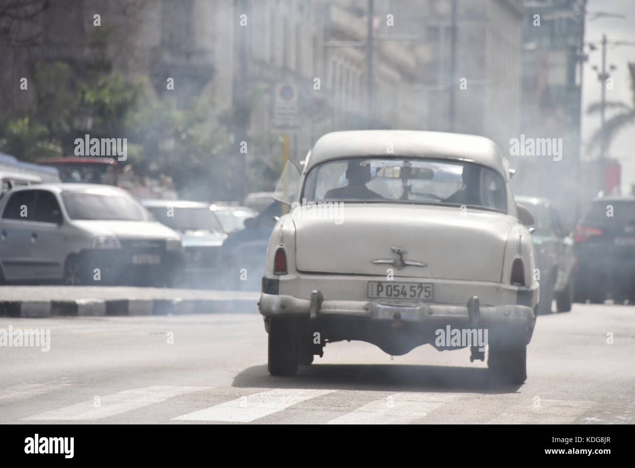 Air pollution created by old cars hires stock photography and images