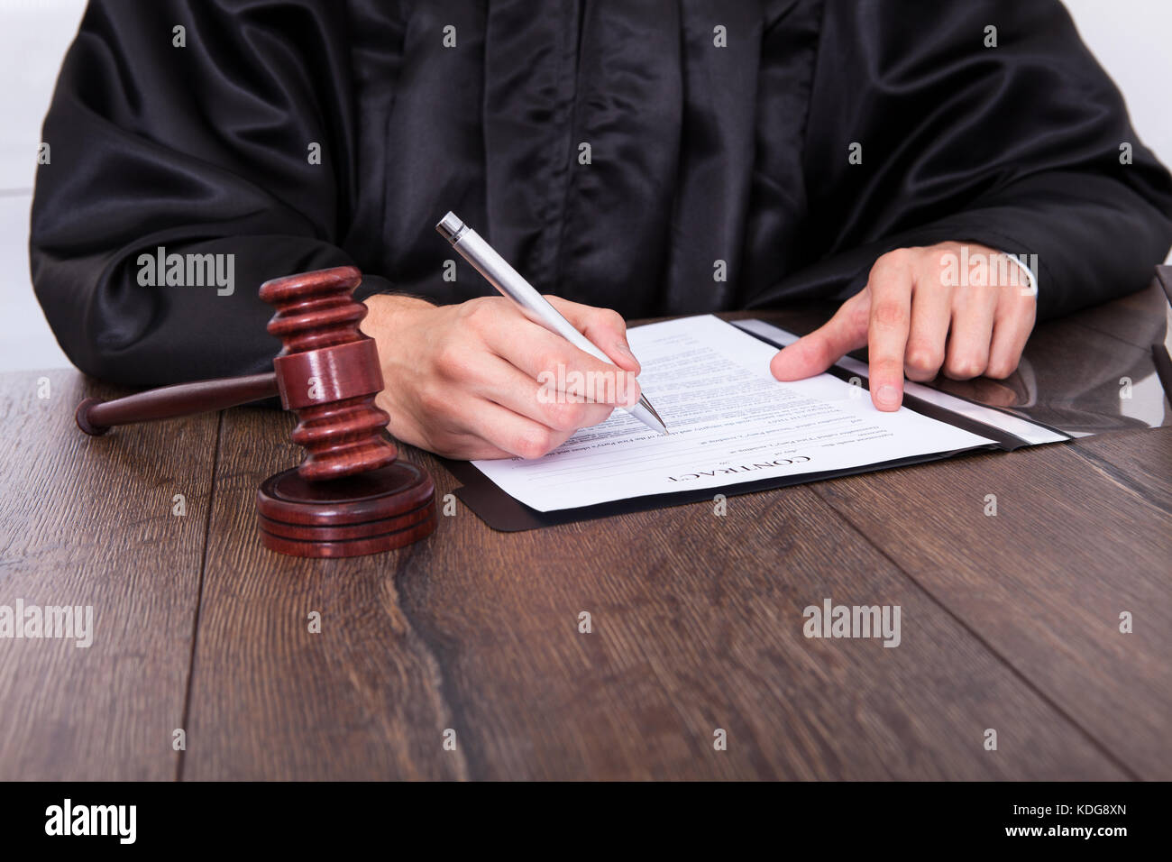 Closeup Of A Judge Hitting Mallet At Desk Stock Photo Alamy