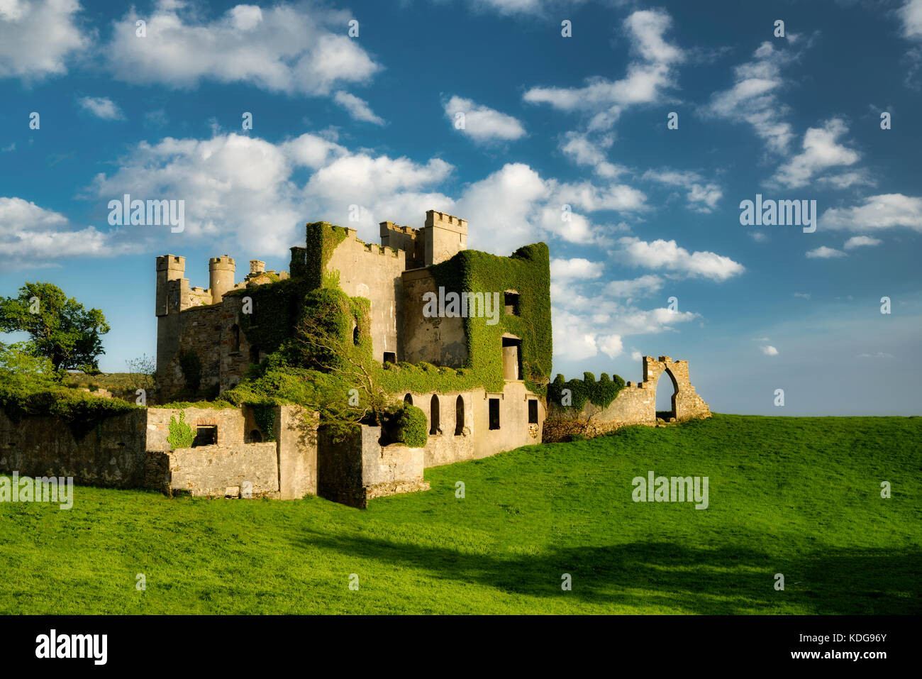 Clifden Castle with clouds and pasture. County Galway, Ireland Stock Photo