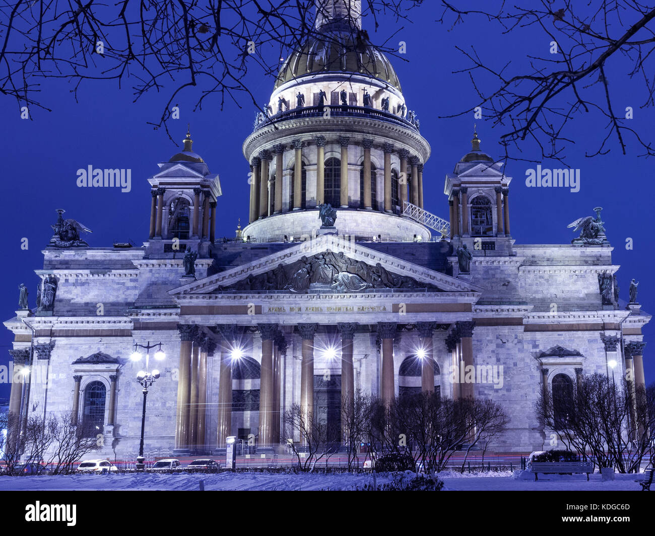 Old historical architecture landmark and touristic spot in Saint Petersburg, Russia: Saint Isaac's Cathedral by a winter night illuminated. Stock Photo