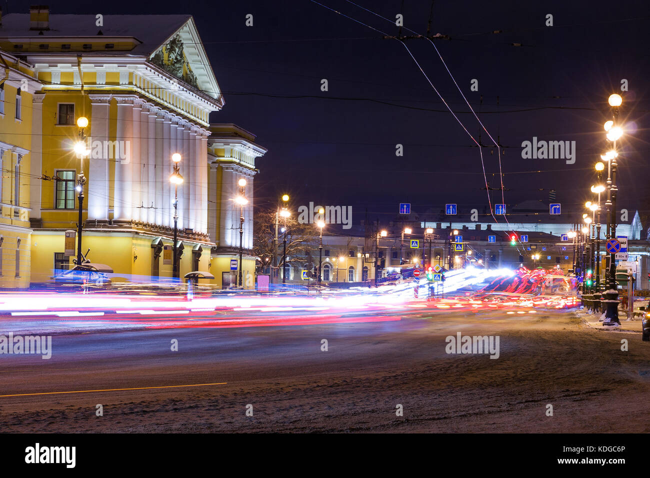 Old historical architecture landmark and touristic spot in Saint Petersburg, Russia: old historical exchange building by a winter night illuminated wi Stock Photo