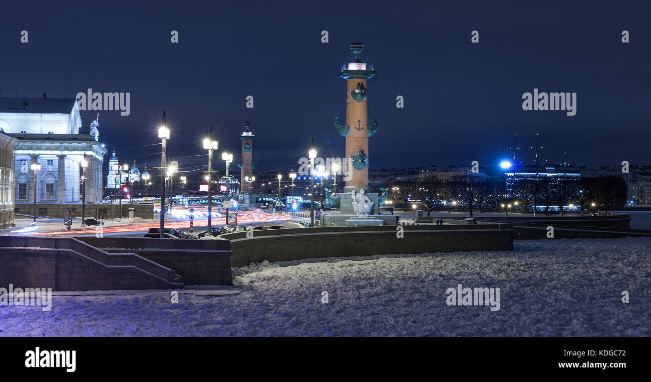 Touristic landmark in Saint Petersburg, Russia: the Spit of Vasilievsky Island illuminated by a winter night with the historical Exchange building, th Stock Photo