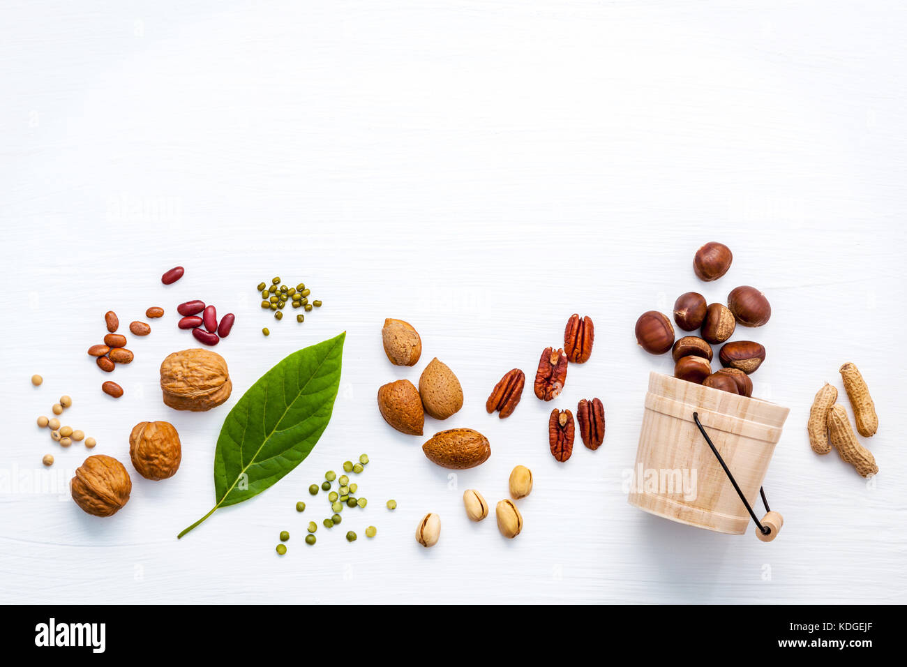 Different kinds of nuts . Walnuts,almonds ,pecan ,pea nuts, pistachio