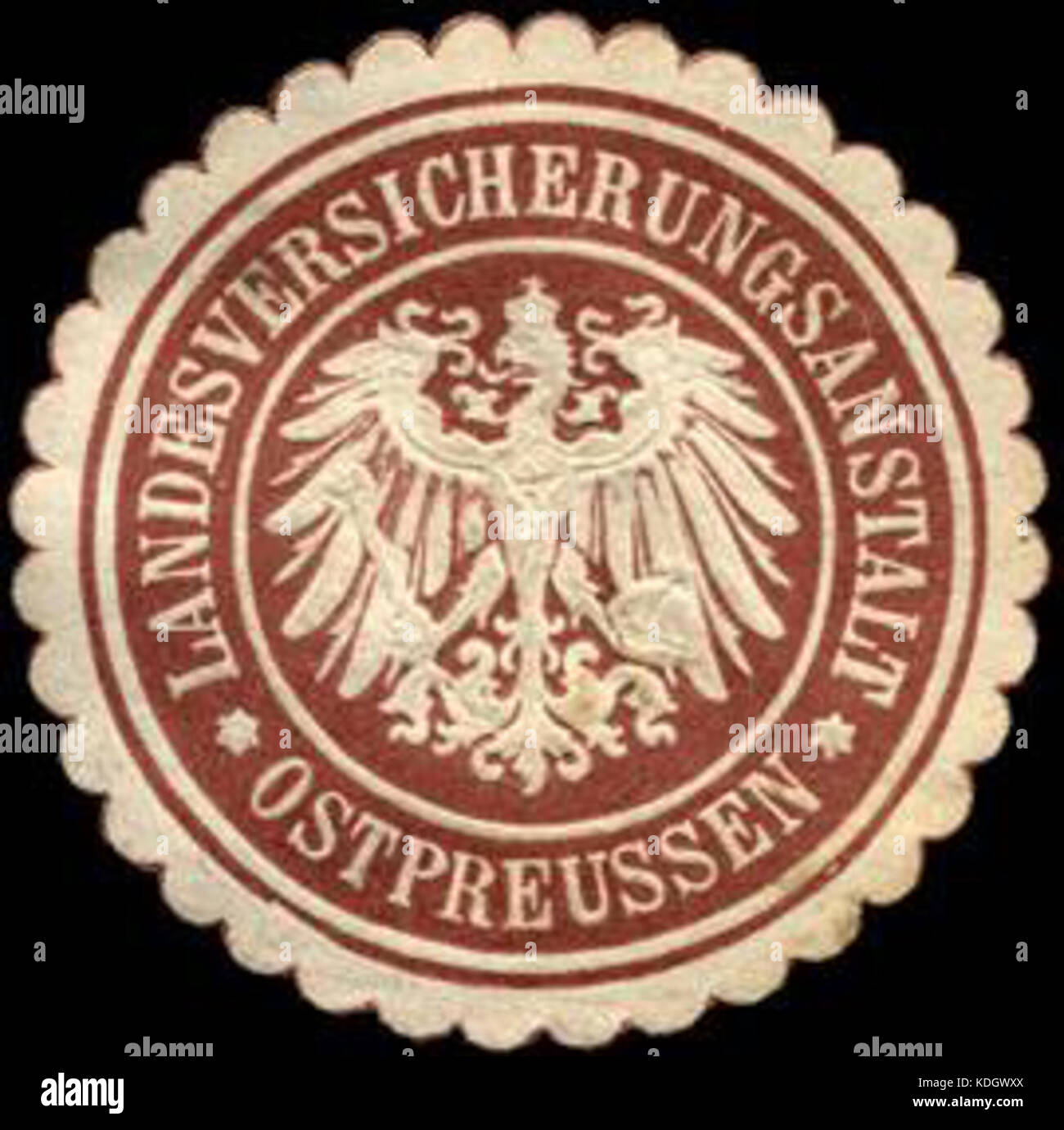This is a historical seal used by the Landesversicherungsanstalt Ostpreussen, an insurance institution in East Prussia. The seal represents the organization’s official documents and administrative function during the early 20th century. Stock Photo