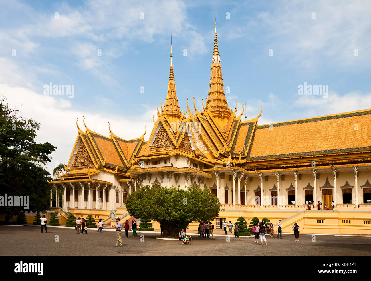 PHNOM PENH, CAMBODIA - FEBRUARY 21, 2013 - The Throne Hall of Royal Palace in Phnom Penh. Tourists visiting the Royal Palace in Phnom Penh. Stock Photo