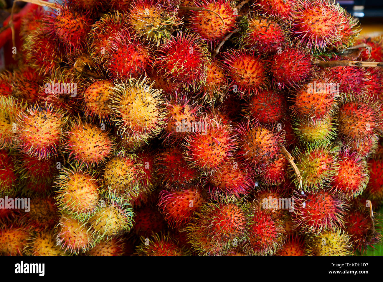 The background of the ripe fruits rambutan Stock Photo