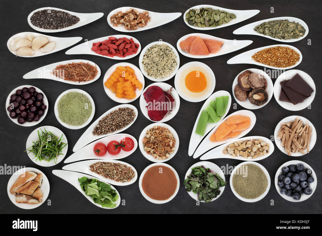 Super foods to boost brain power on slate background. Health food concept high in omega 3 fatty