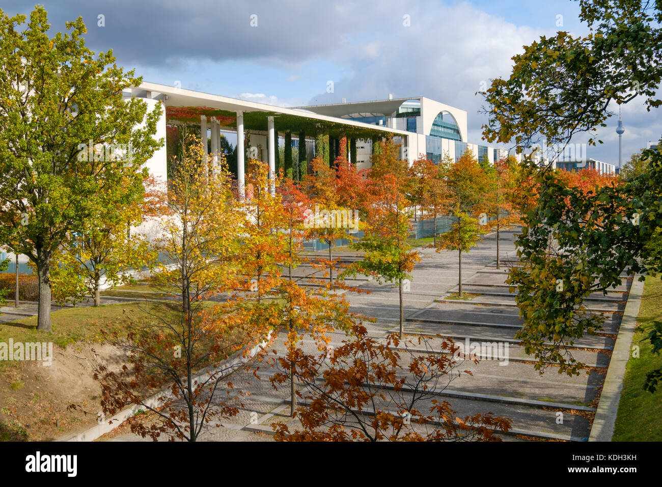 Colorful trees on a sunny day in Berlin, government district during autumn Stock Photo