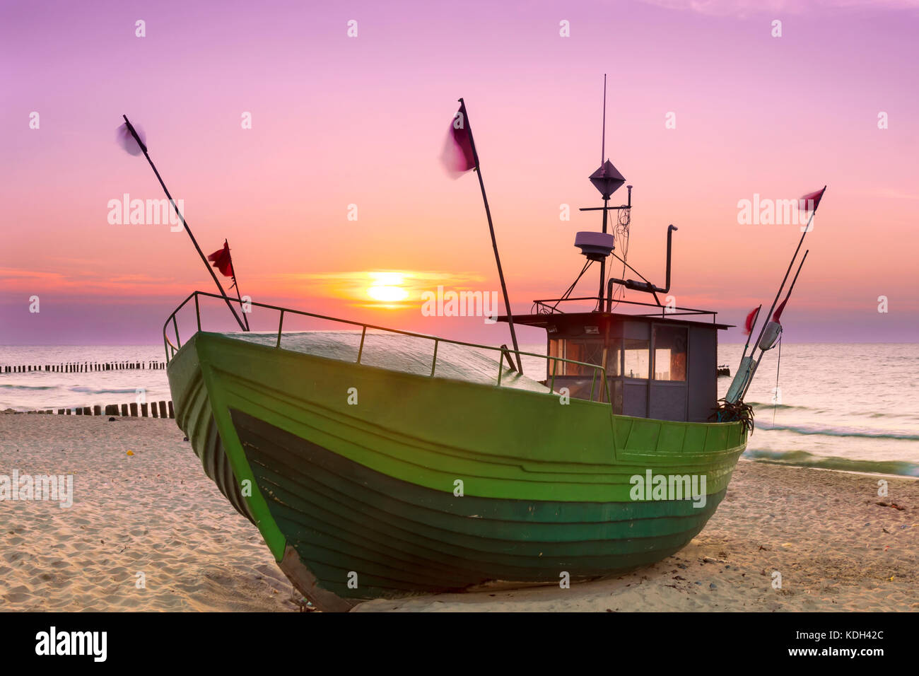 Sights of Poland. Sunset at Baltic sea with fishing boats. Stock Photo