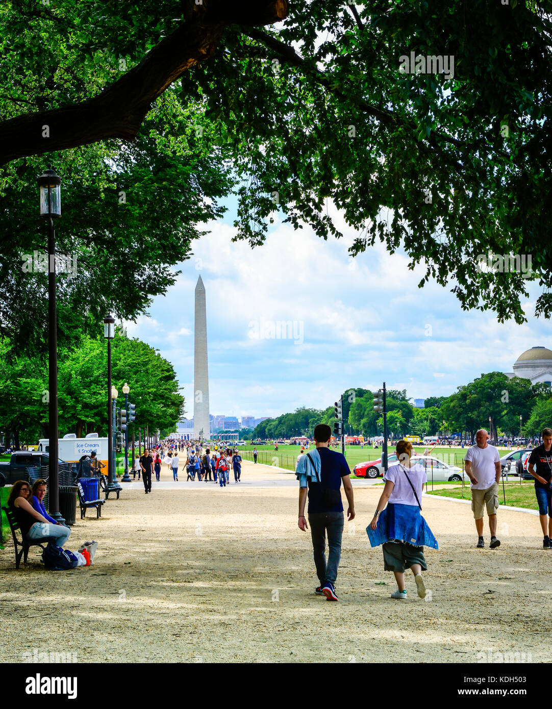 People strolling along the National Mall area with the Washington
