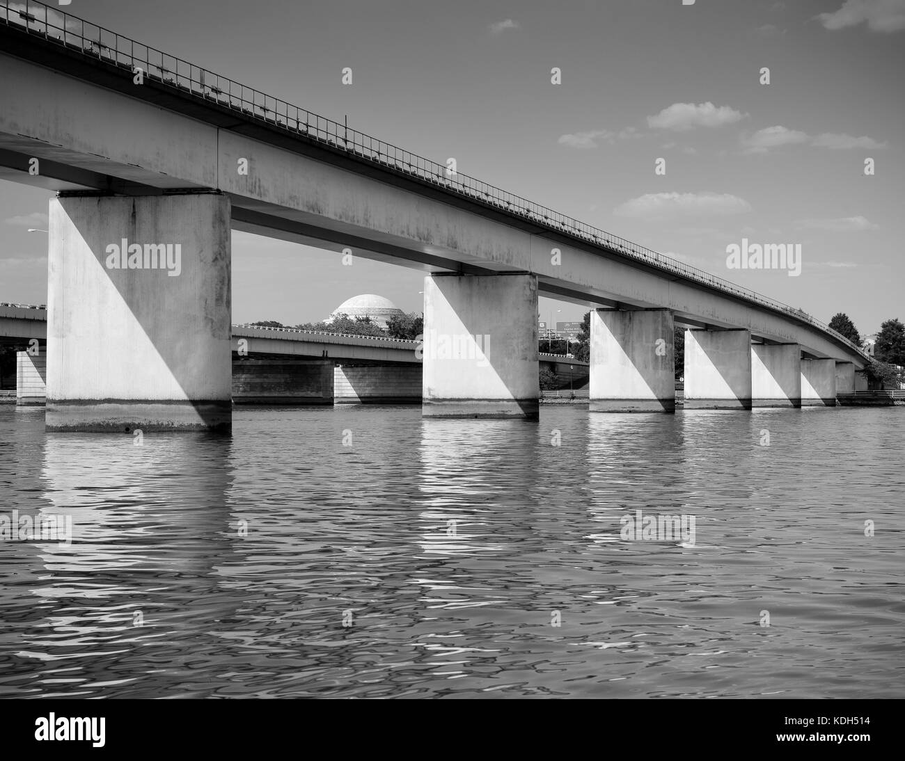 View across the Potomac river and the Theodore Roosevelt Bridge crossing from Washington, DC to the Commonwealth of Virginia, Stock Photo