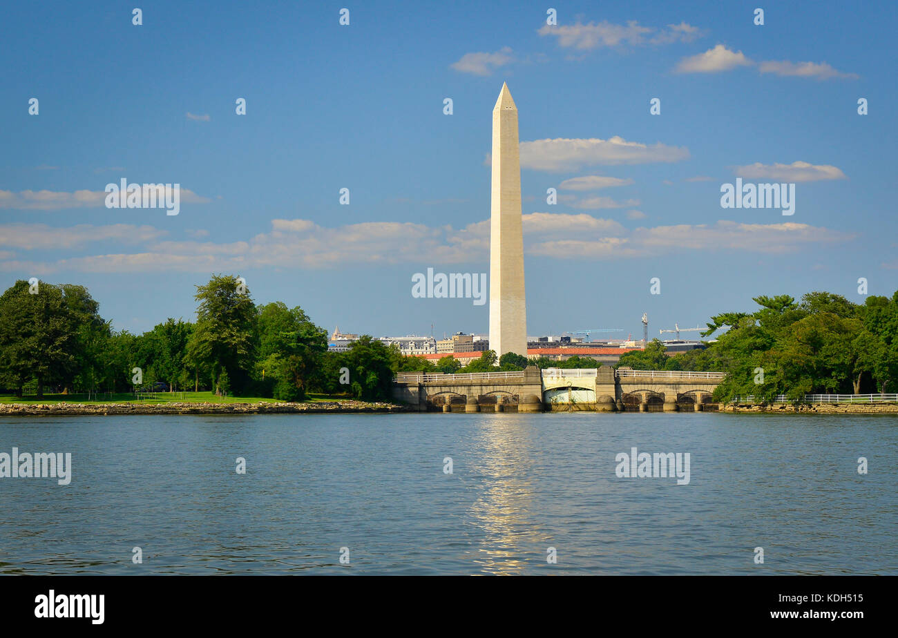 A view across the Potomac River of the Arlington Memorial Bridge and the Washington Monument in the distance, in Washington, DC, USA Stock Photo