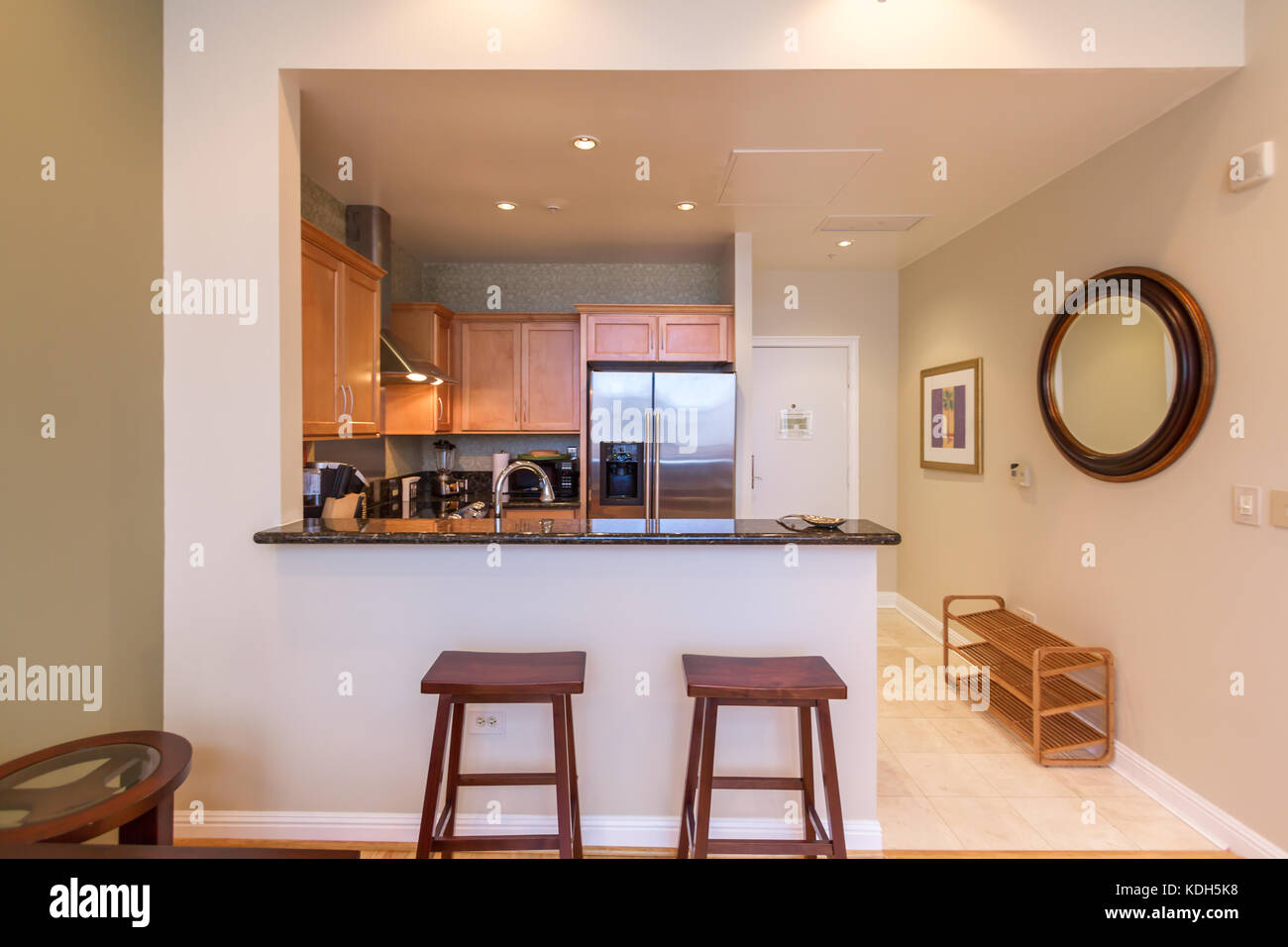 Dinning area with view into the kitchen of a hotel/condo rental Stock Photo