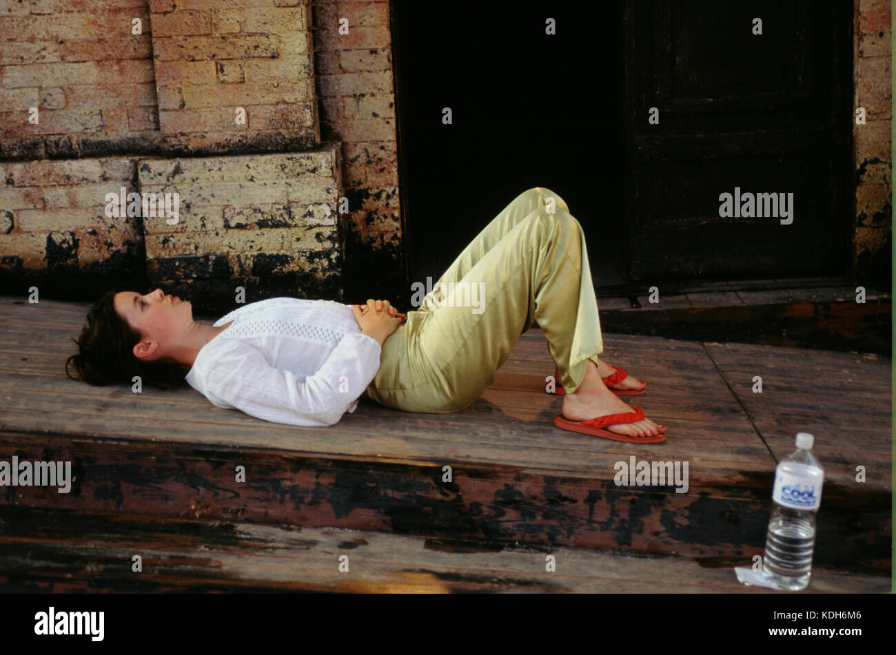 Actress from the Royal Shakespeare Company meditating before her performance in As You Like It in Lahore, Pakistan. Stock Photo