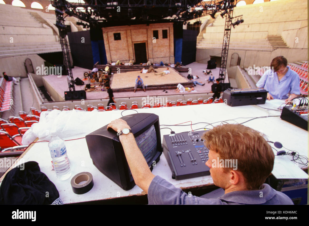 Rehearsal Performance Tech Example Technicians manage sound and lighting during a stage rehearsal at an ...